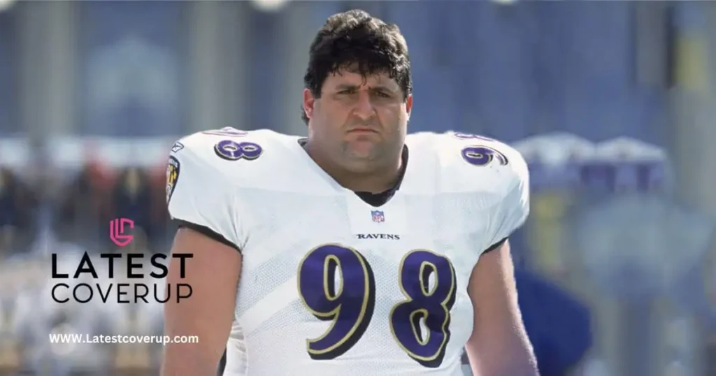 Baltimore Ravens player on the field, showcasing athleticism and team spirit, reflecting Tony Siragusa’s Bio in NFL history.